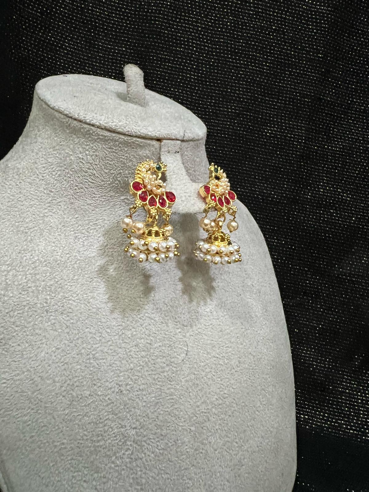 Gold Plated Pearl Jhumka Earrings with Red Stones for Women