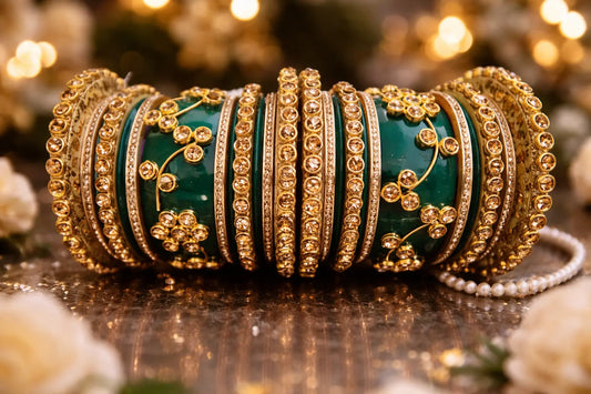 Green Rajwadi bridal chura set with gold detailing and kundan stone embellishments