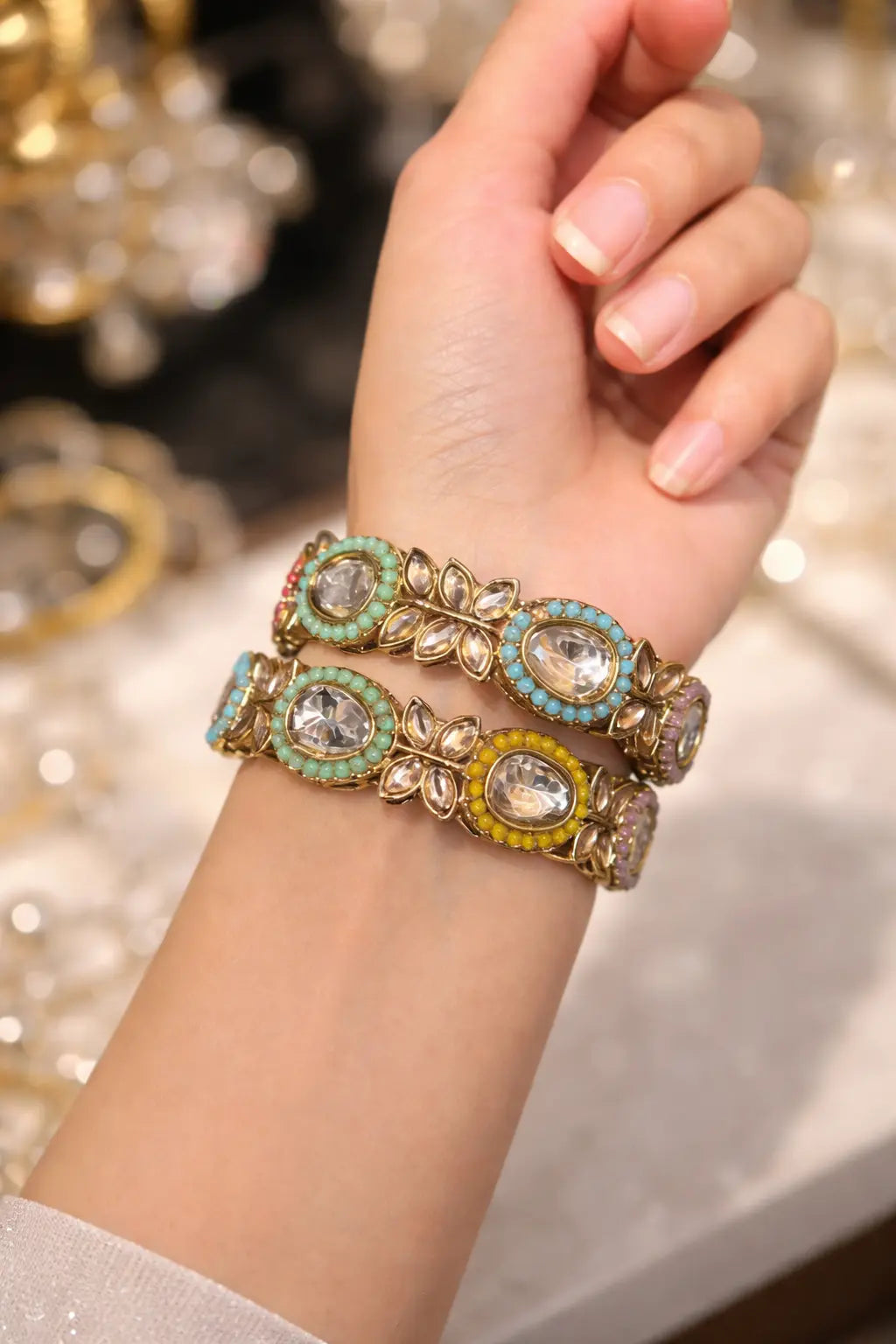 Multi-colour Kundan-style kara with gold-tone finish, crystal stones, and bead detailing