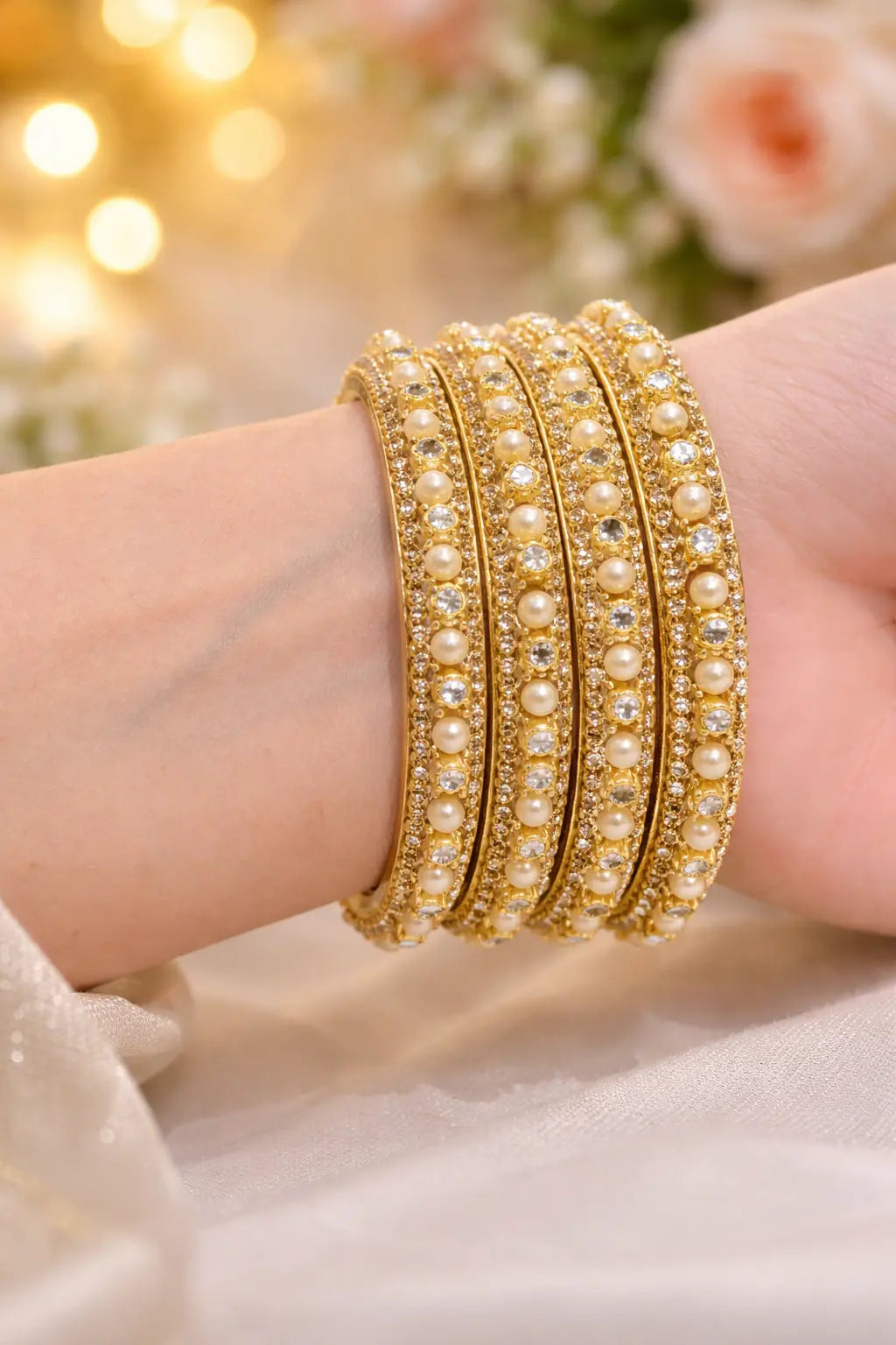 Pearl and stone-studded layered gold kara set for women